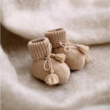 Knitted baby booties - Beige